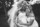bride and bridesmaid laughing