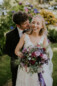 bride and groom smiling