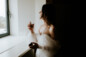 bride using perfume