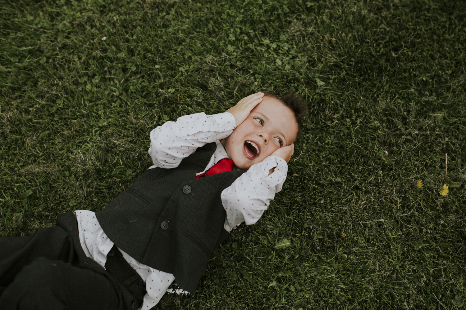 little boy playing at wedding