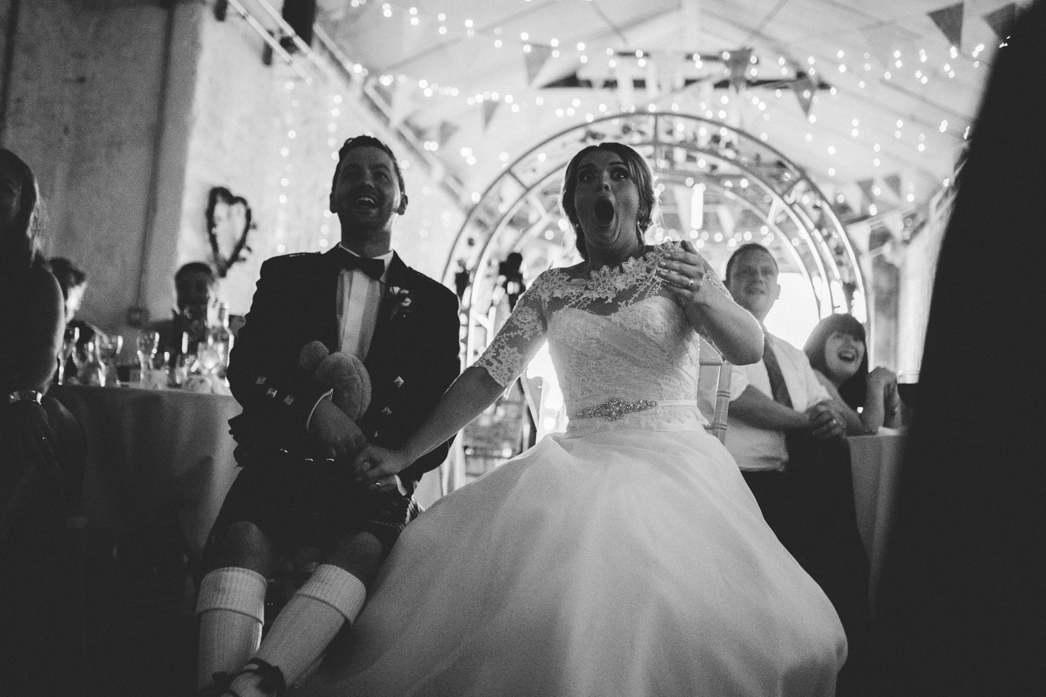 bride and groom laughing