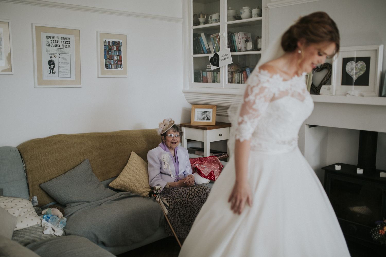 nan smiling at granddaughter in dress