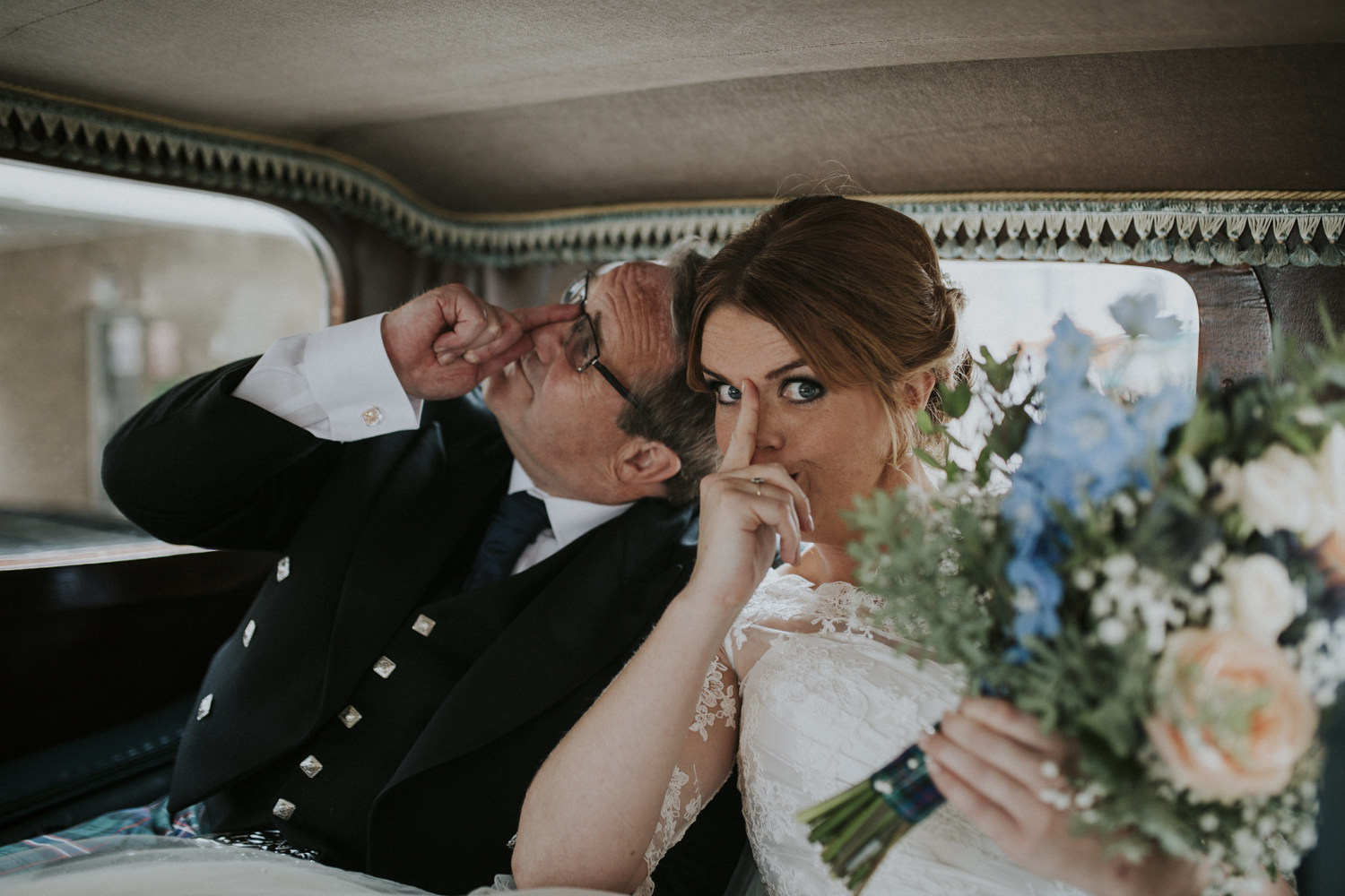 bride and dad in the car