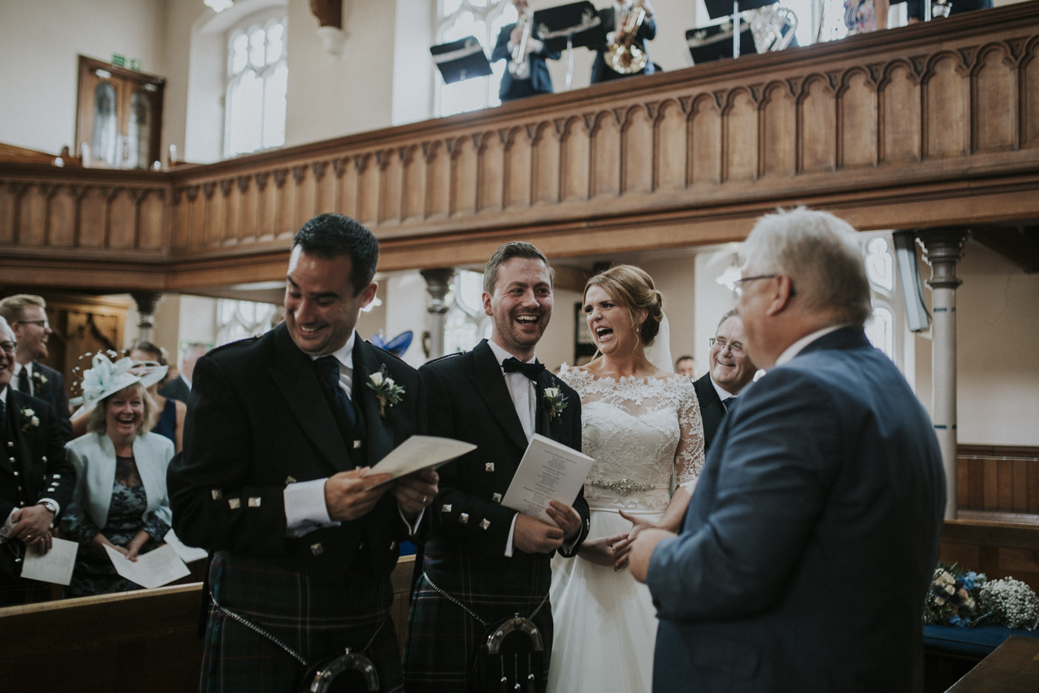 bride and groom laughing