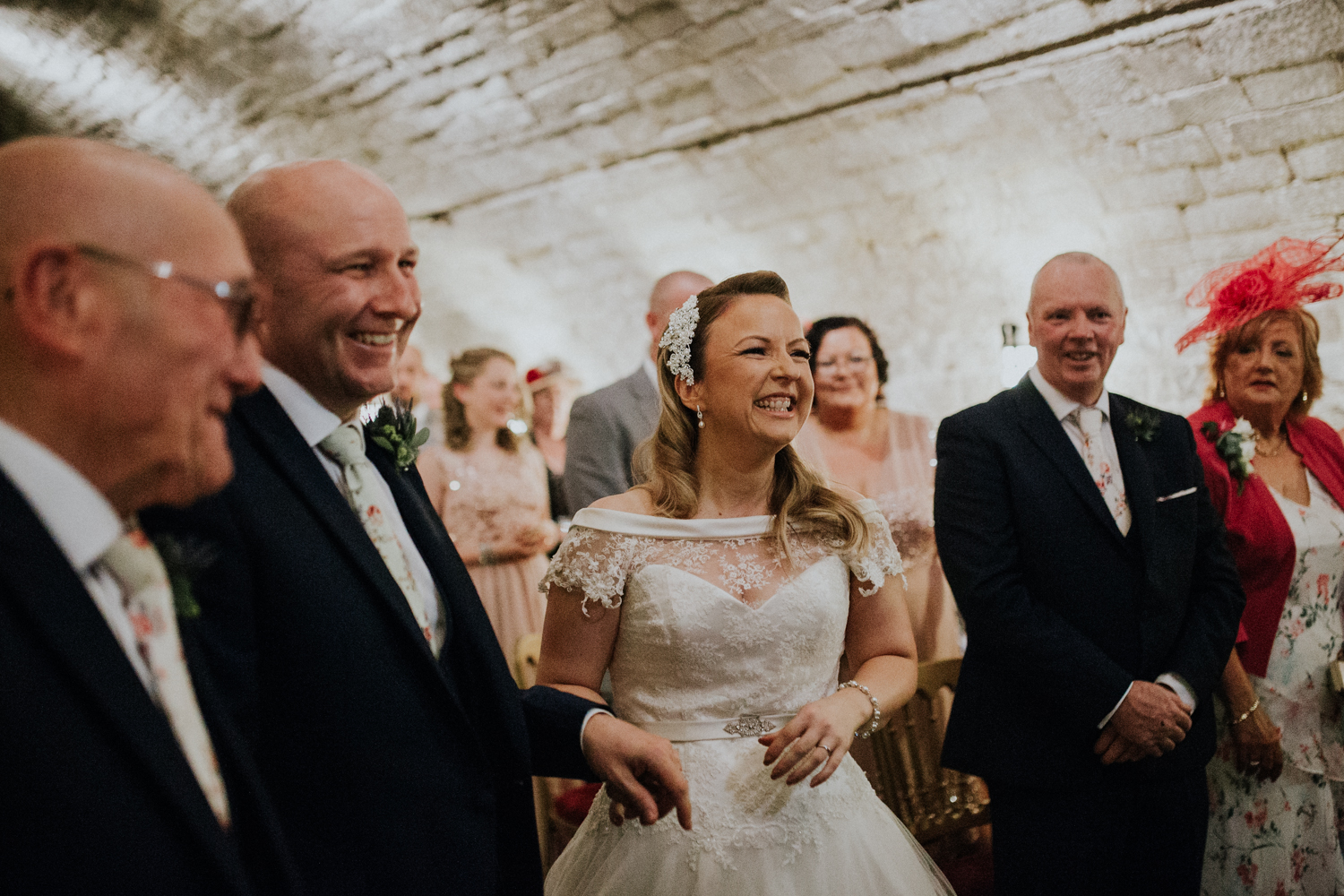 bride and groom laughing