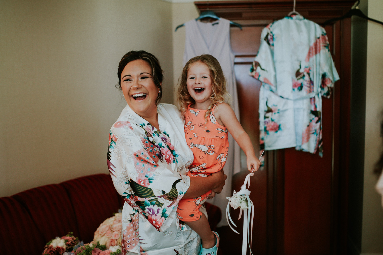 bride and daughter laughing