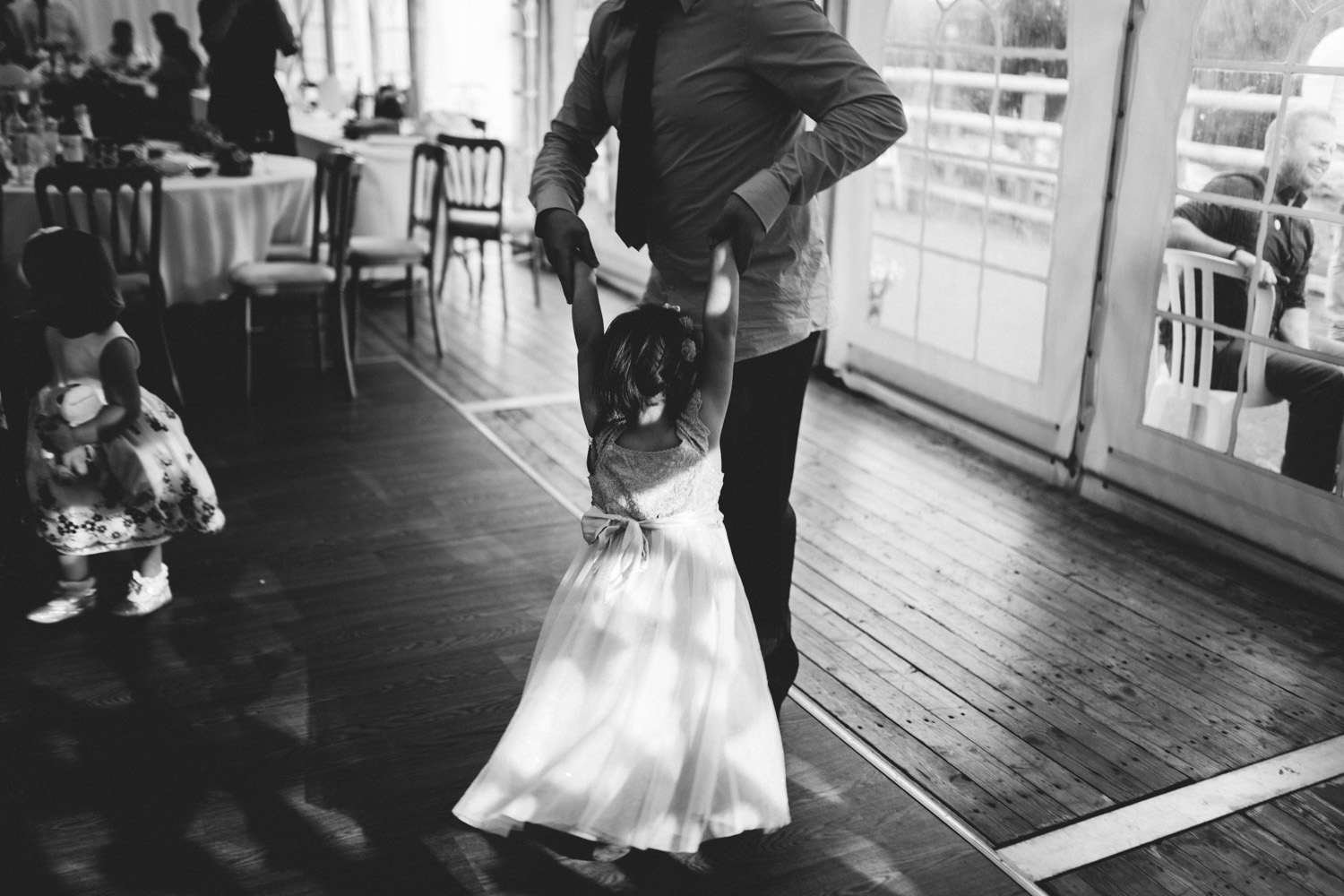 little girl and dad dancing