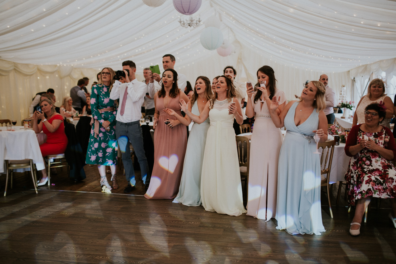 wedding guests laughing