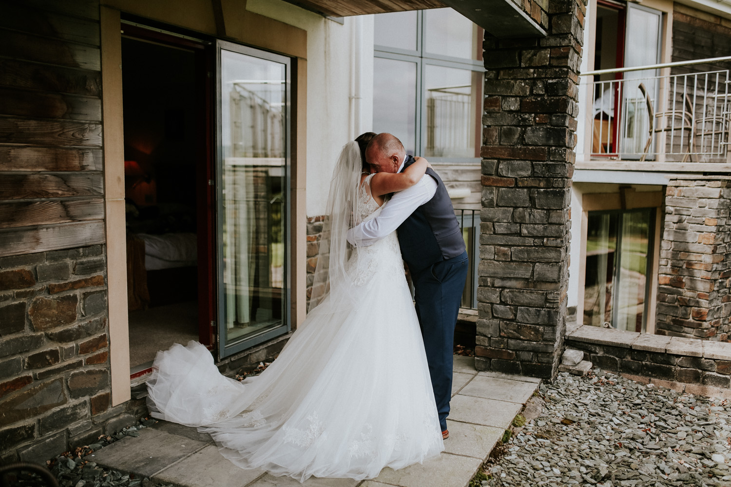 bride hugging dad