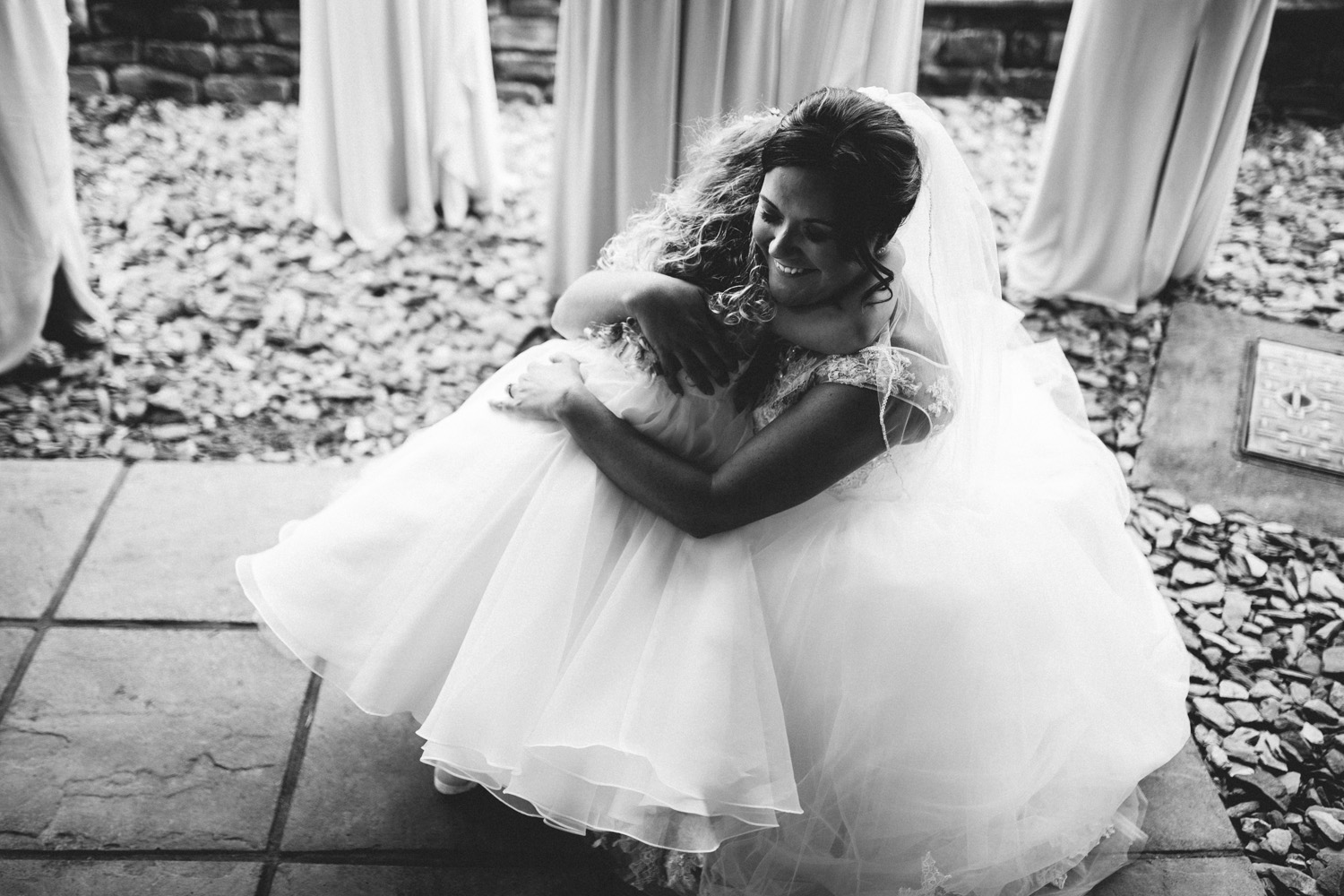 bride and daughter hugging