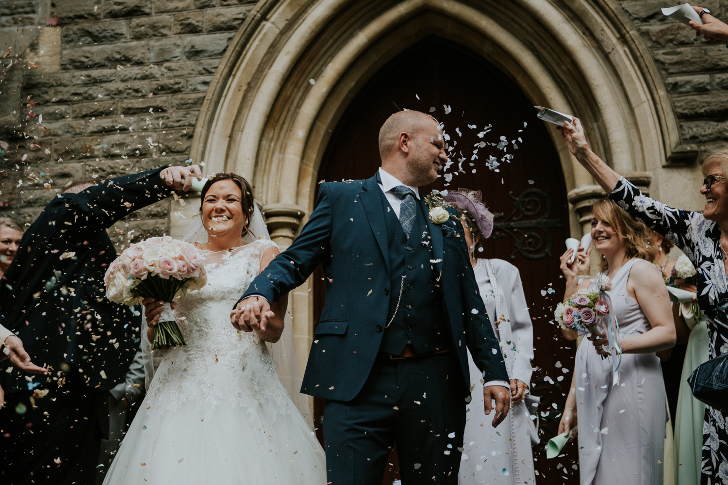 confetti in grooms face