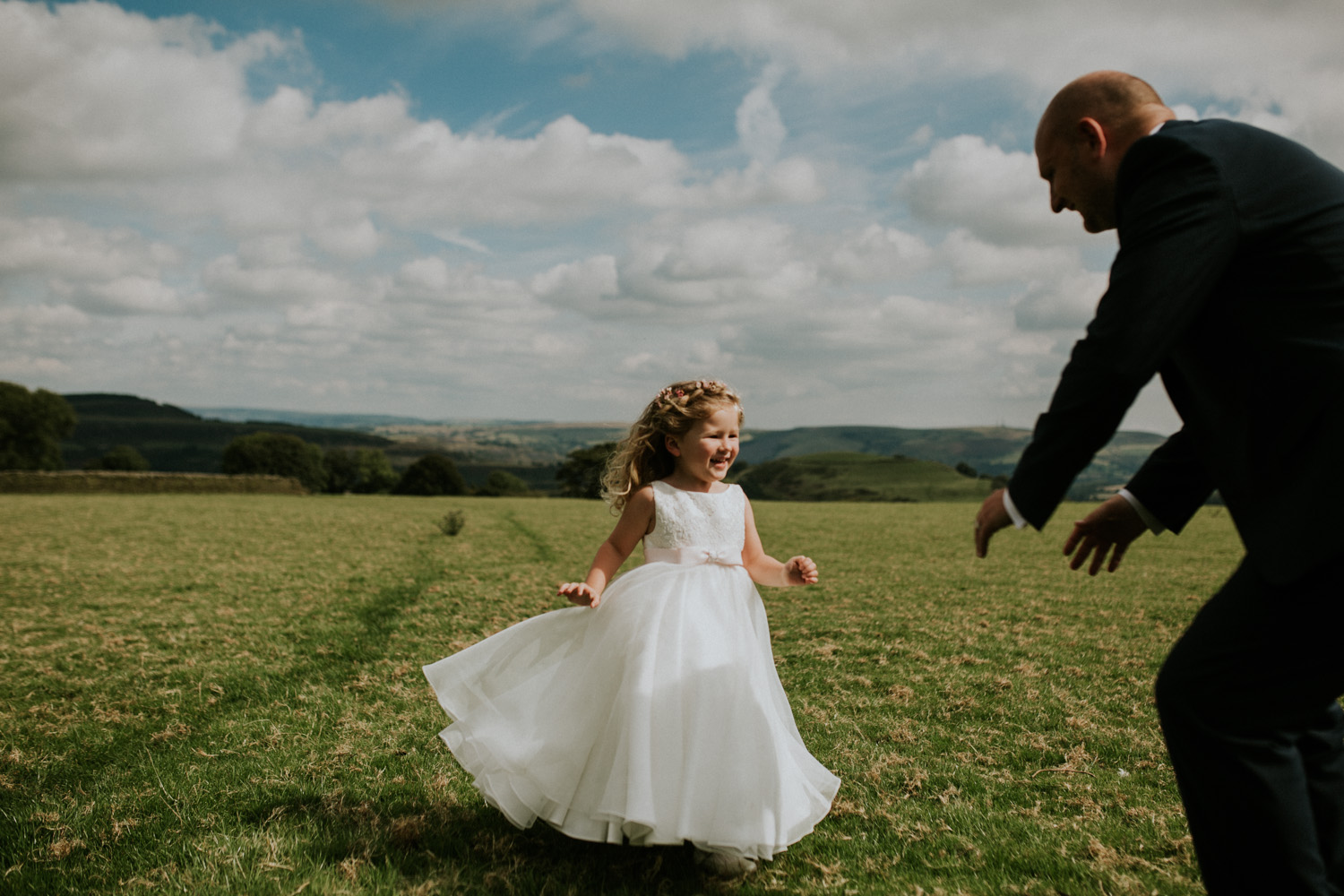 daughter running to groom