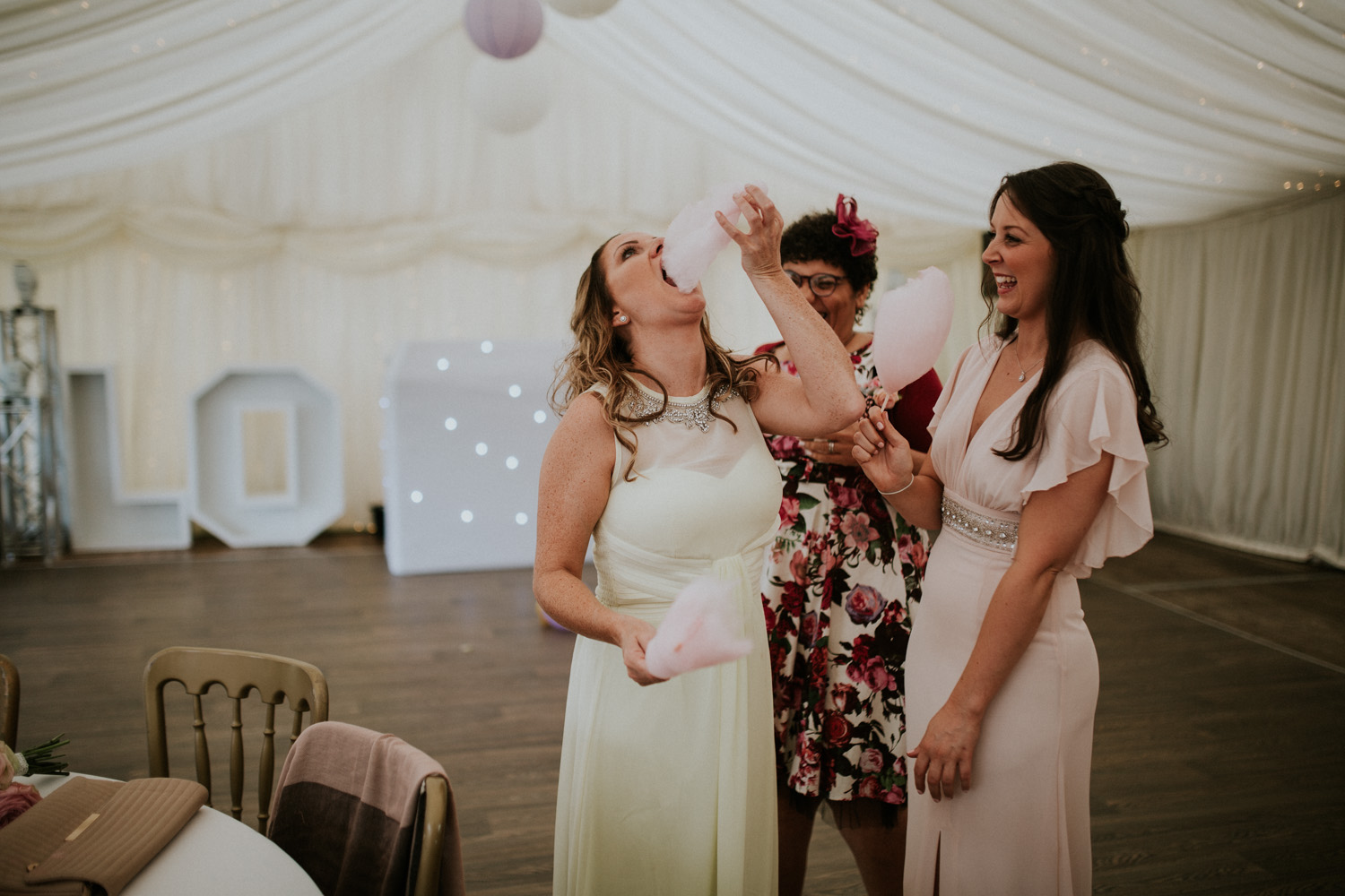 bridesmaids eating candy floss 