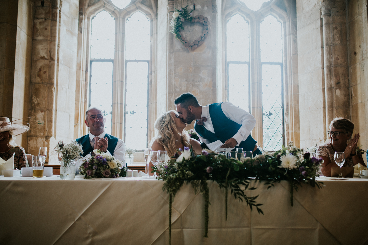 bride and groom kiss