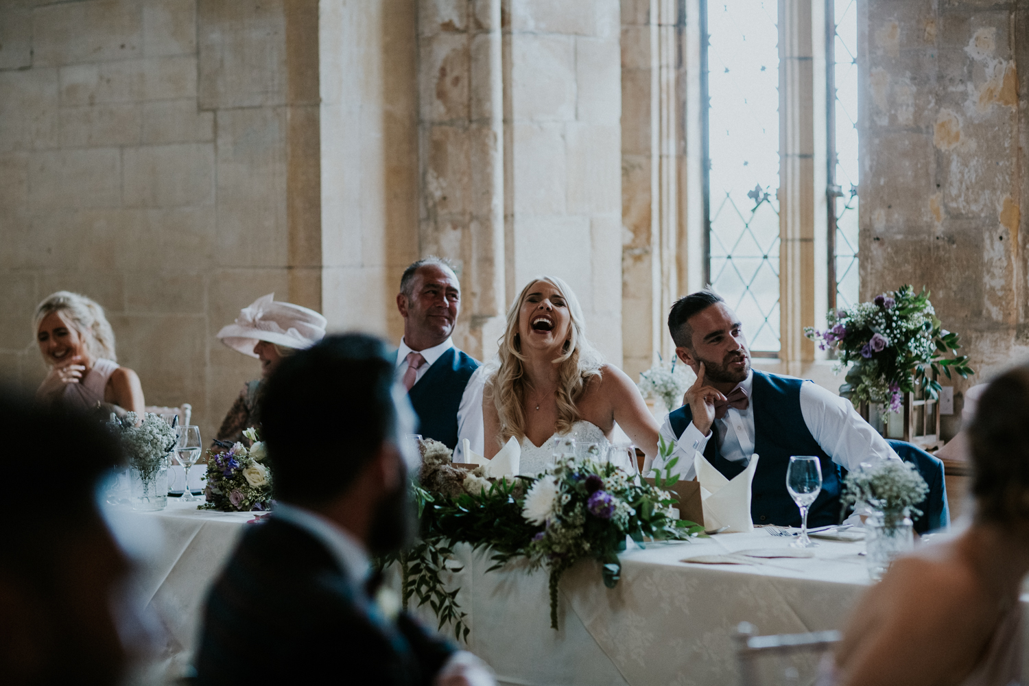 bride laughing at speeches