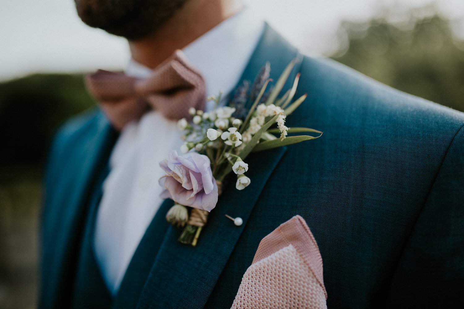 close up of groom details