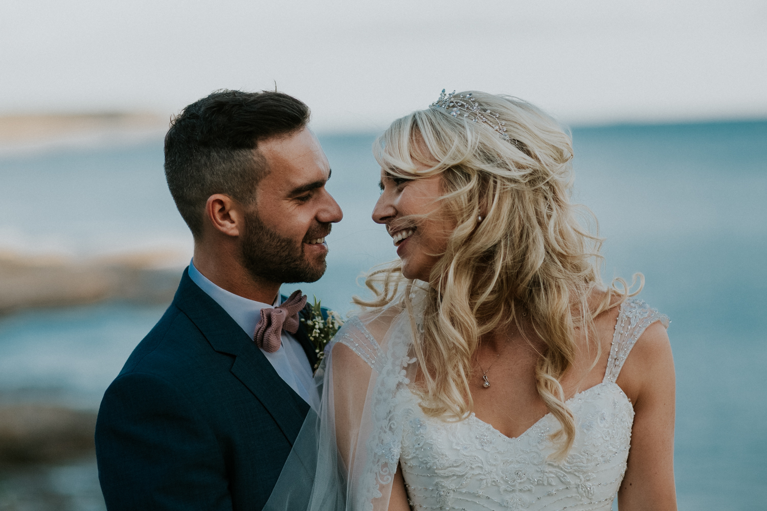 bride and groom at the beach