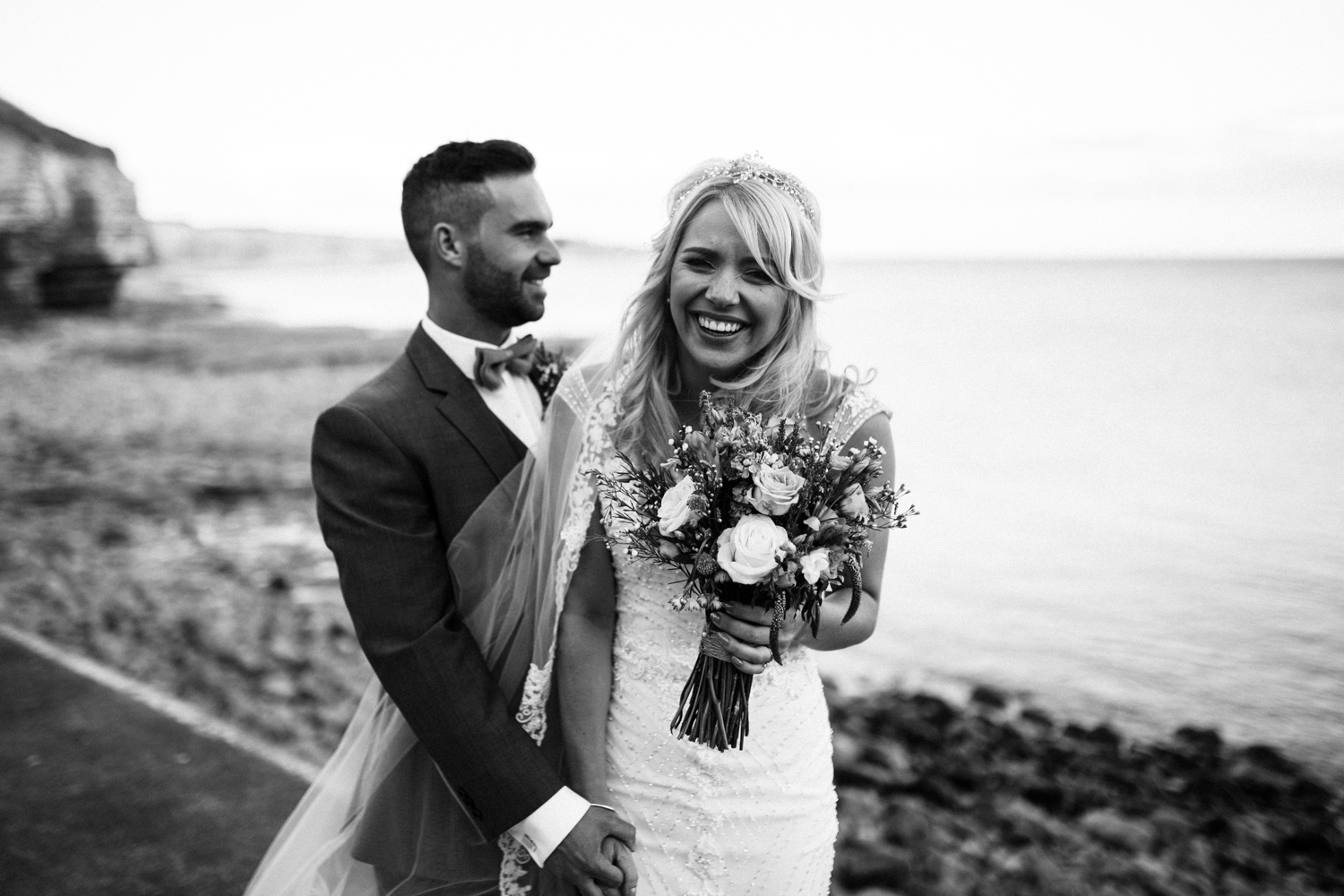 bride and groom at the beach