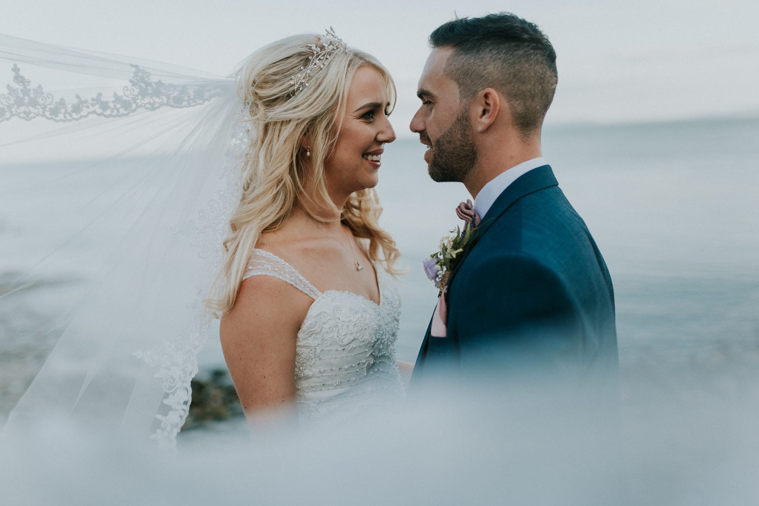 bride and groom at the beach