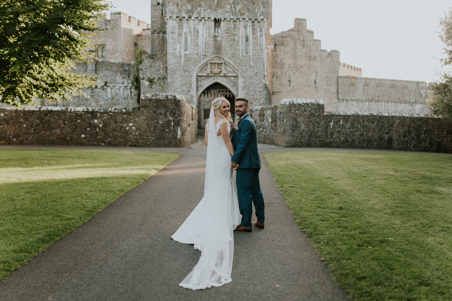 bride and groom portrait outside st donats castle