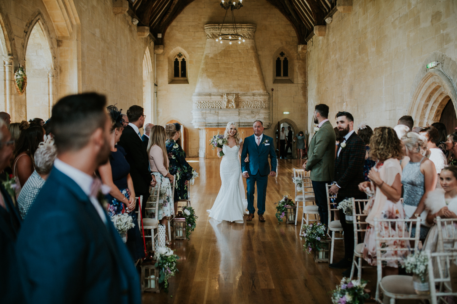 bride and father walking down the isle