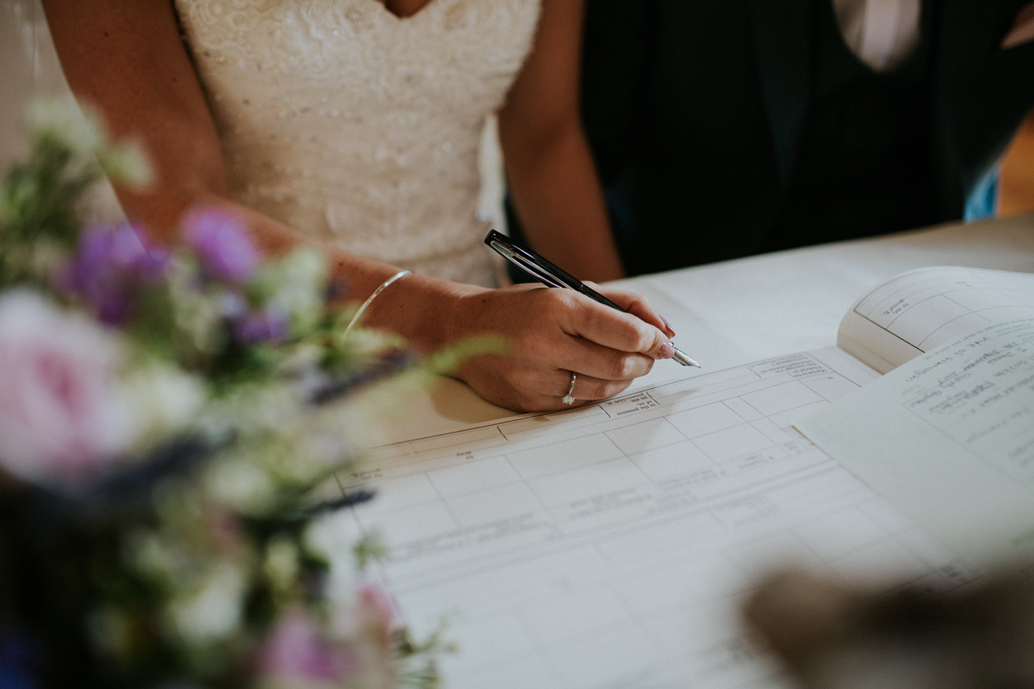 bride singing the registrar