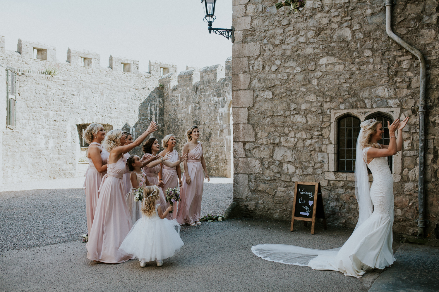 bride throwing the bouquet