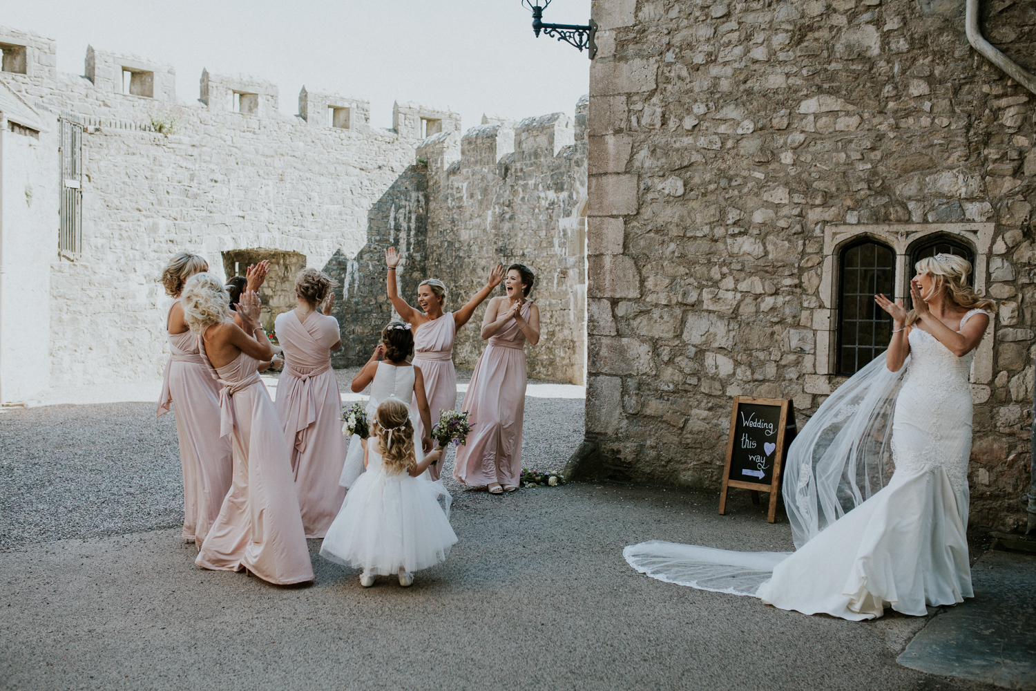 bridesmaid catches bouquet