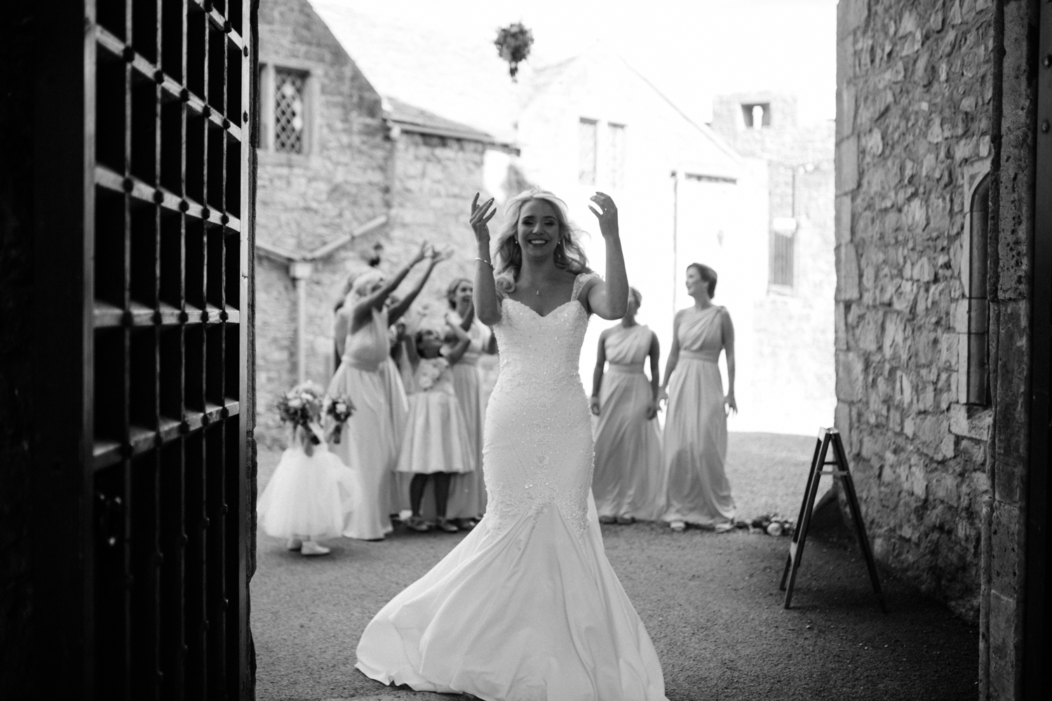 bride throwing the bouquet