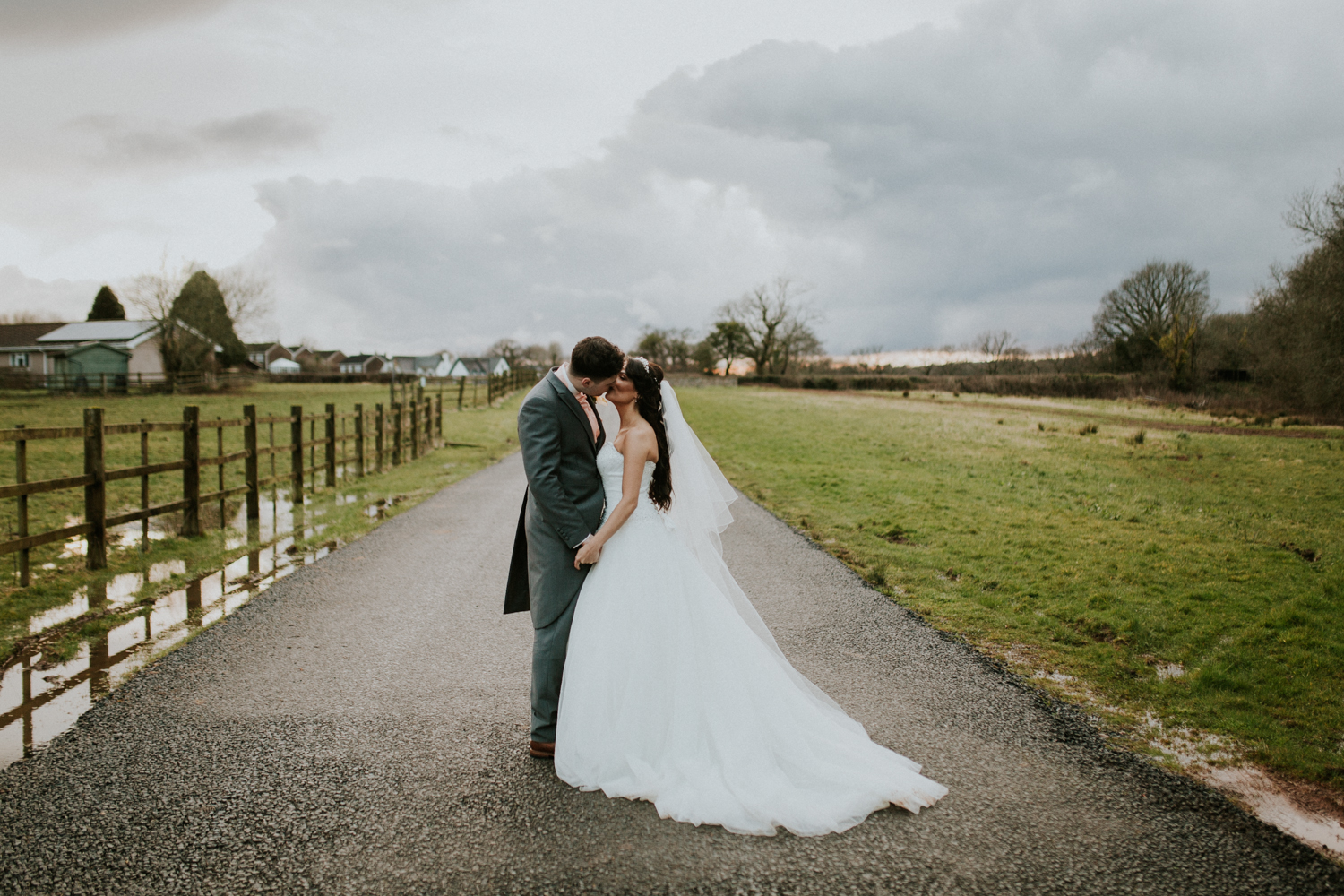 bride and groom kissing