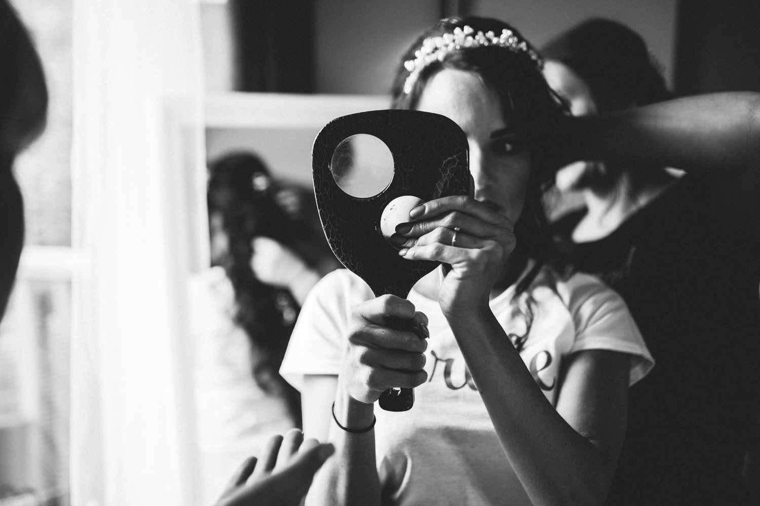  bride looking in the mirror 