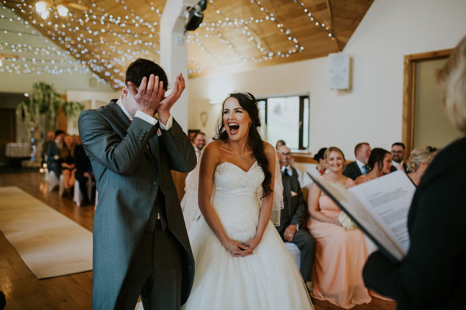 bride and groom laughing