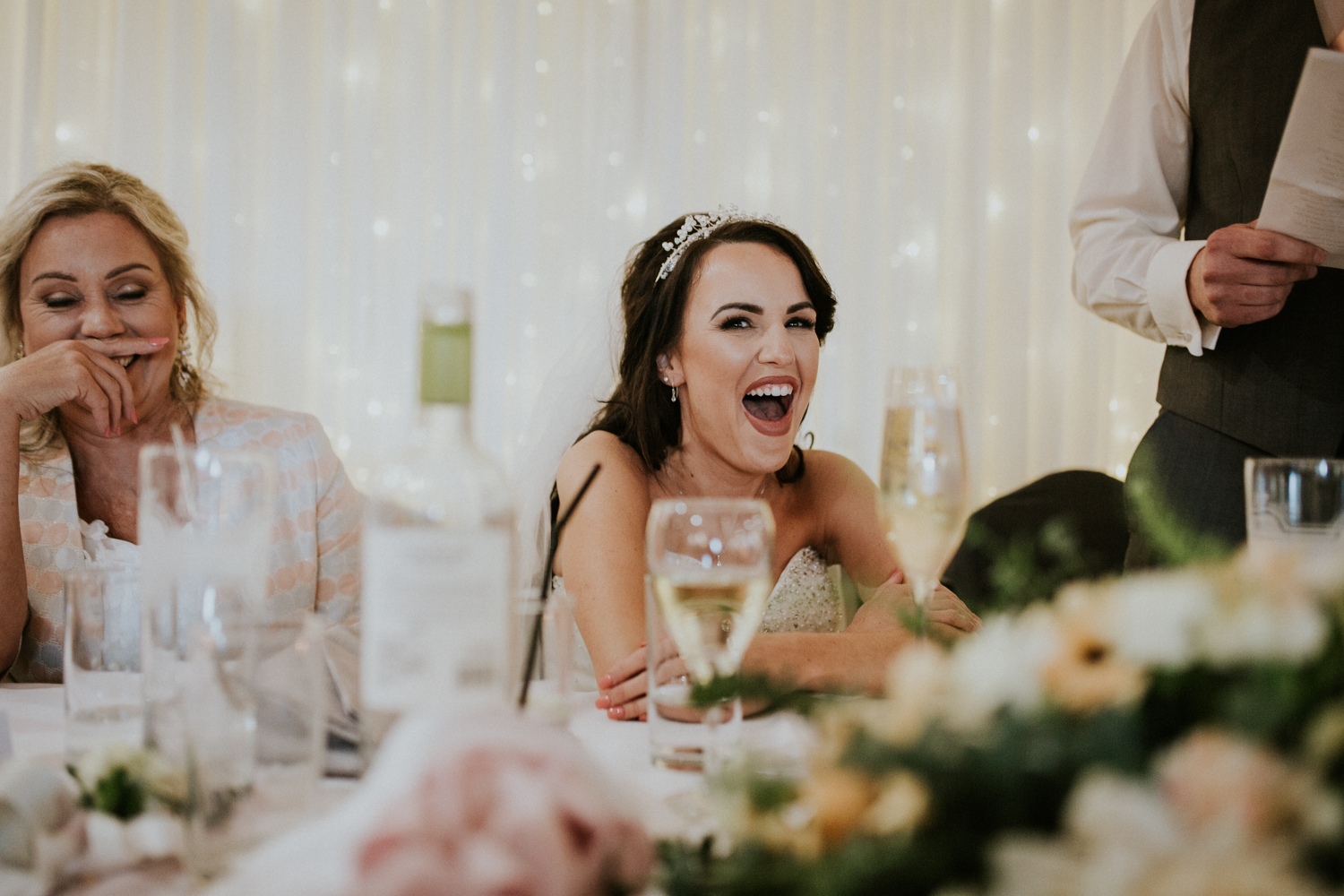 bride laughing at speech