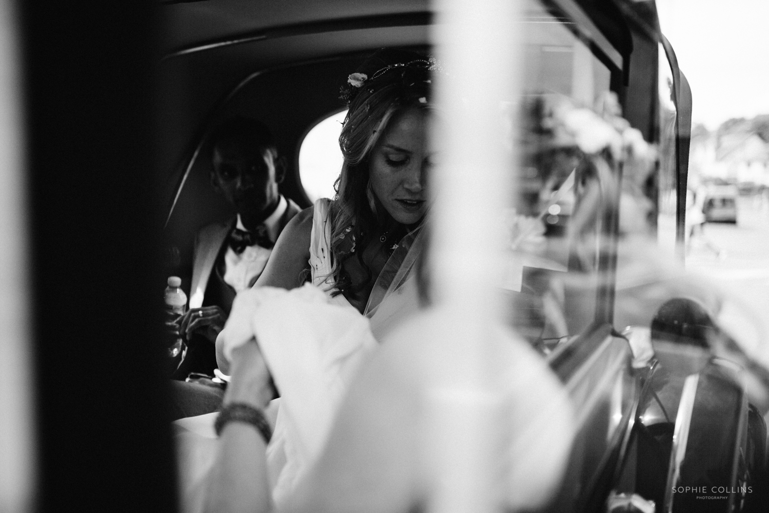 bride in wedding car