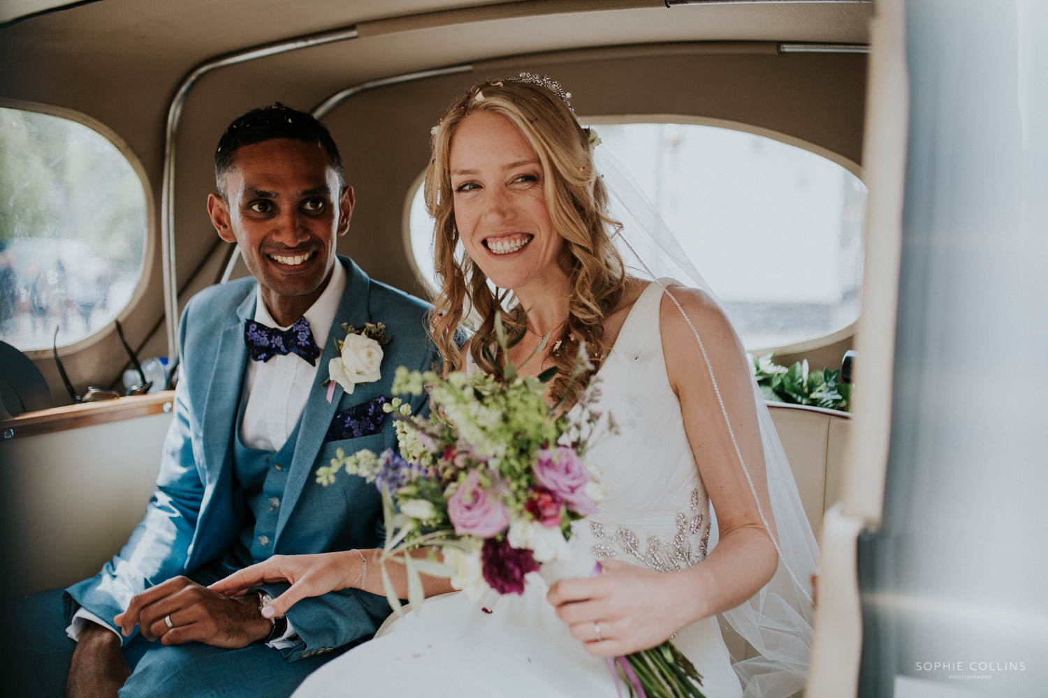 couple in wedding car