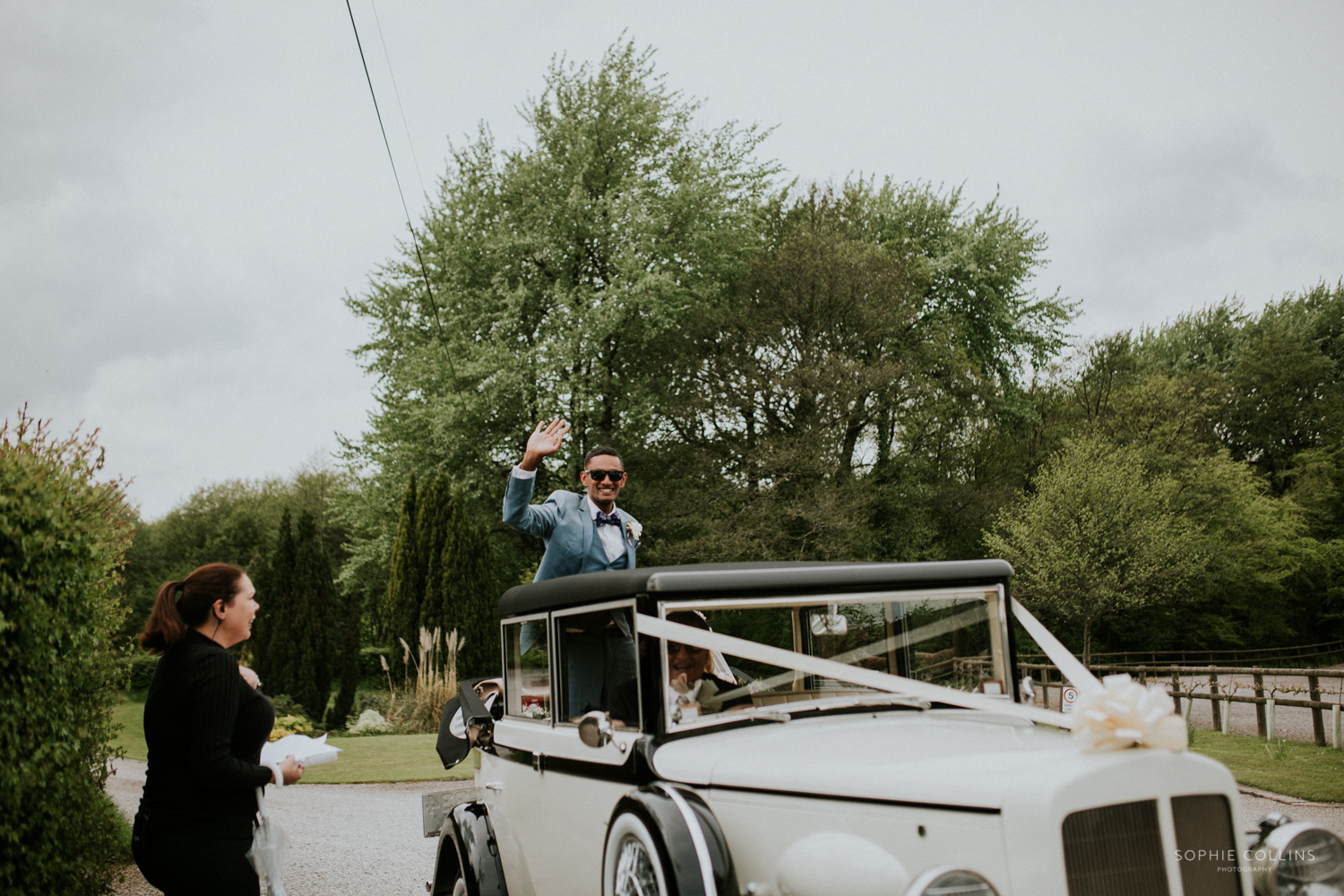 groom waving