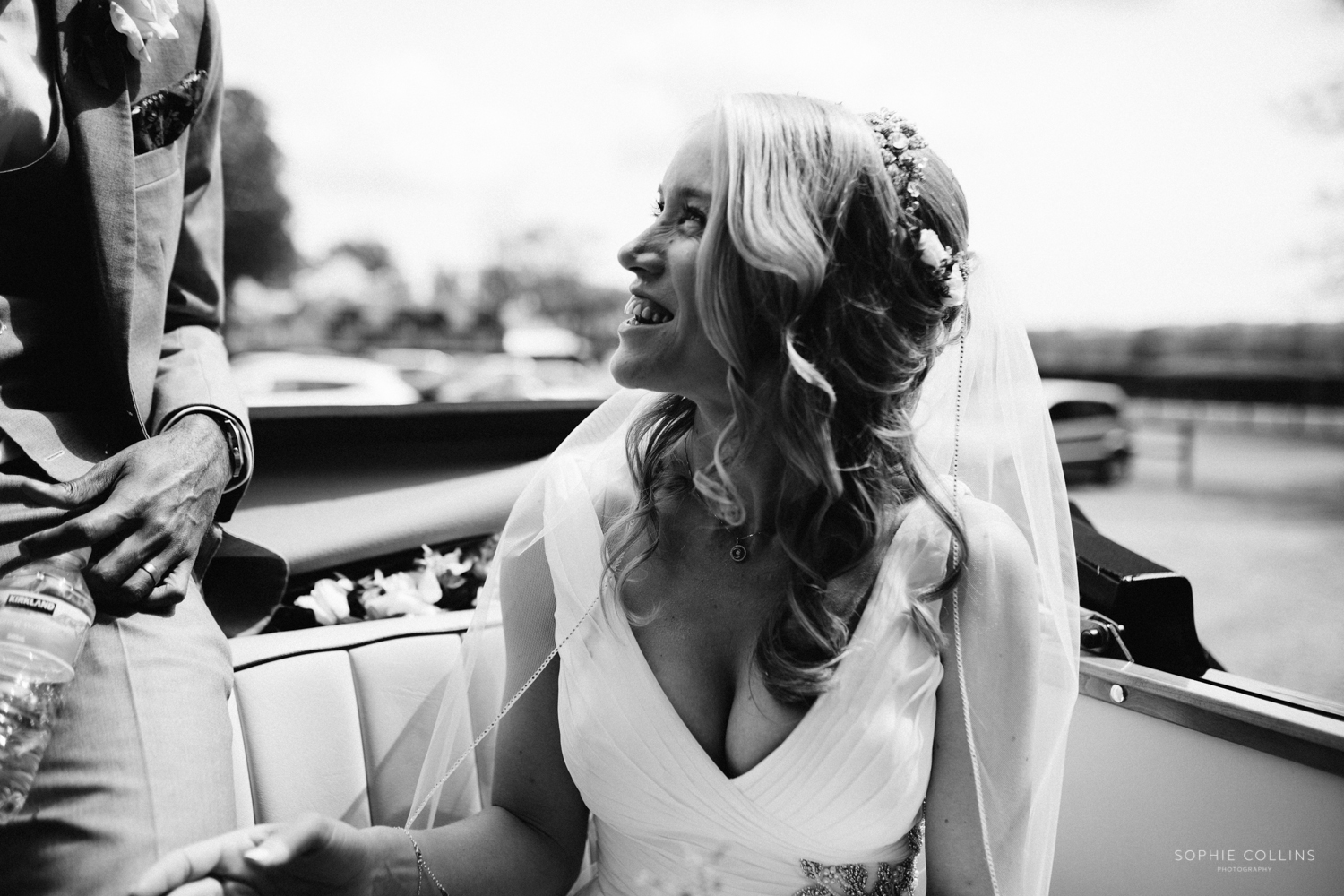 bride in wedding car
