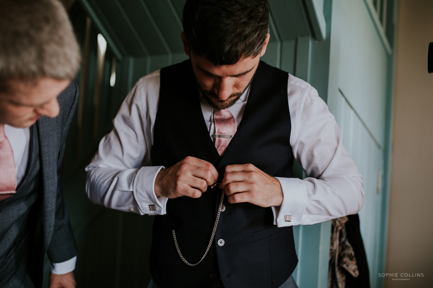 groom putting on his watch