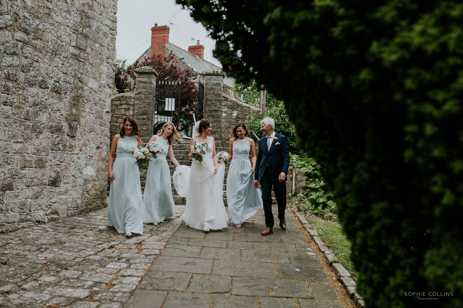 bride and bridesmaids walking