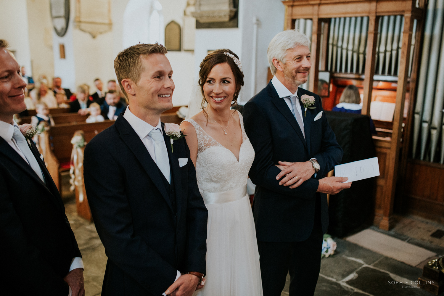 bride smiling at groom