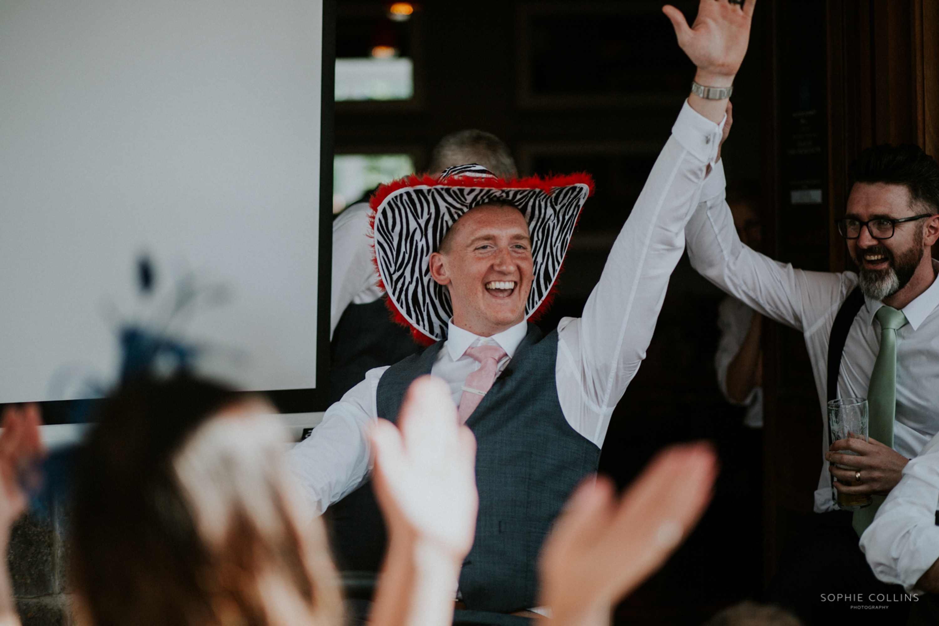 best man wearing a hat