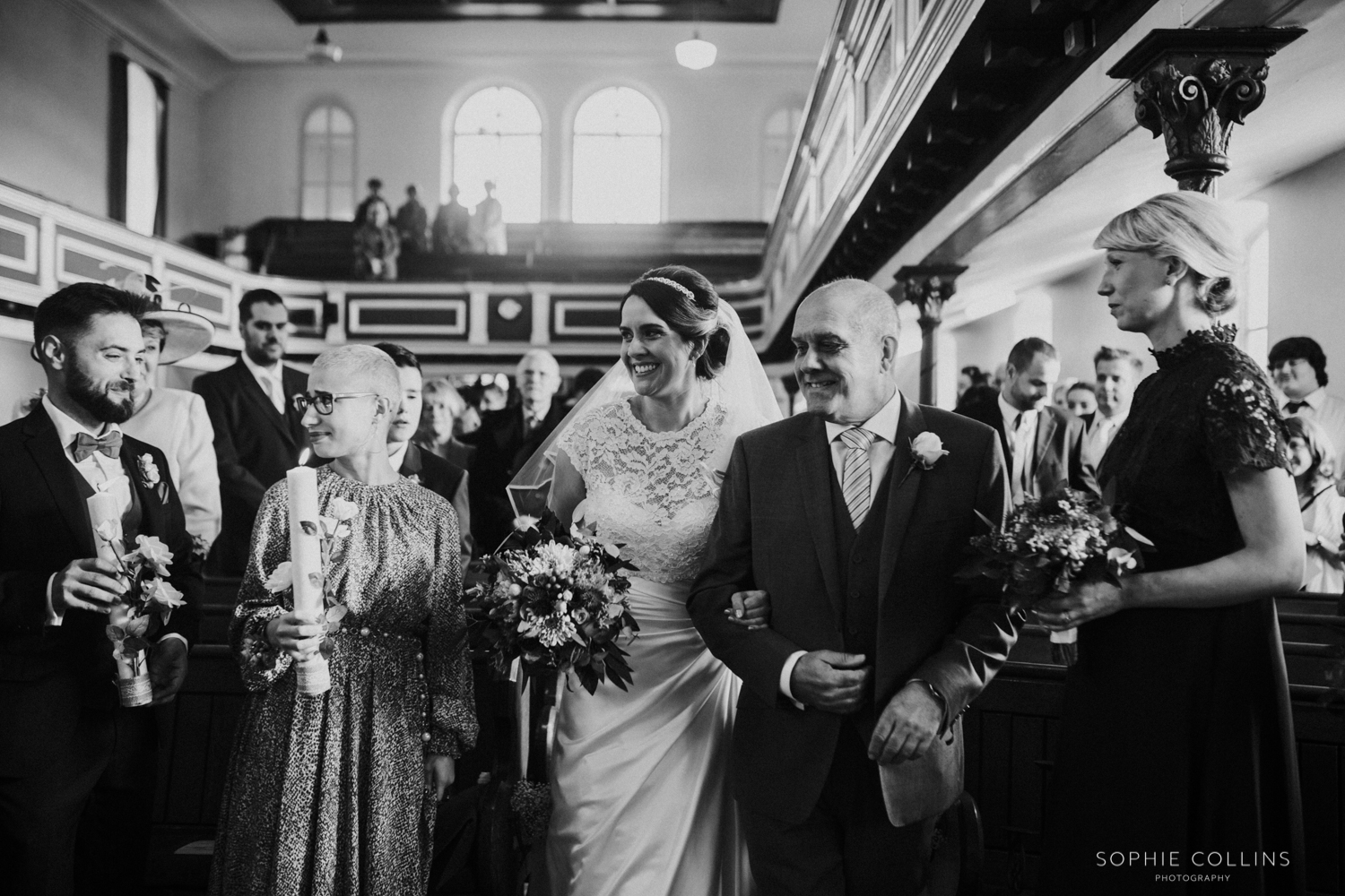 bride and dad walking down the isle