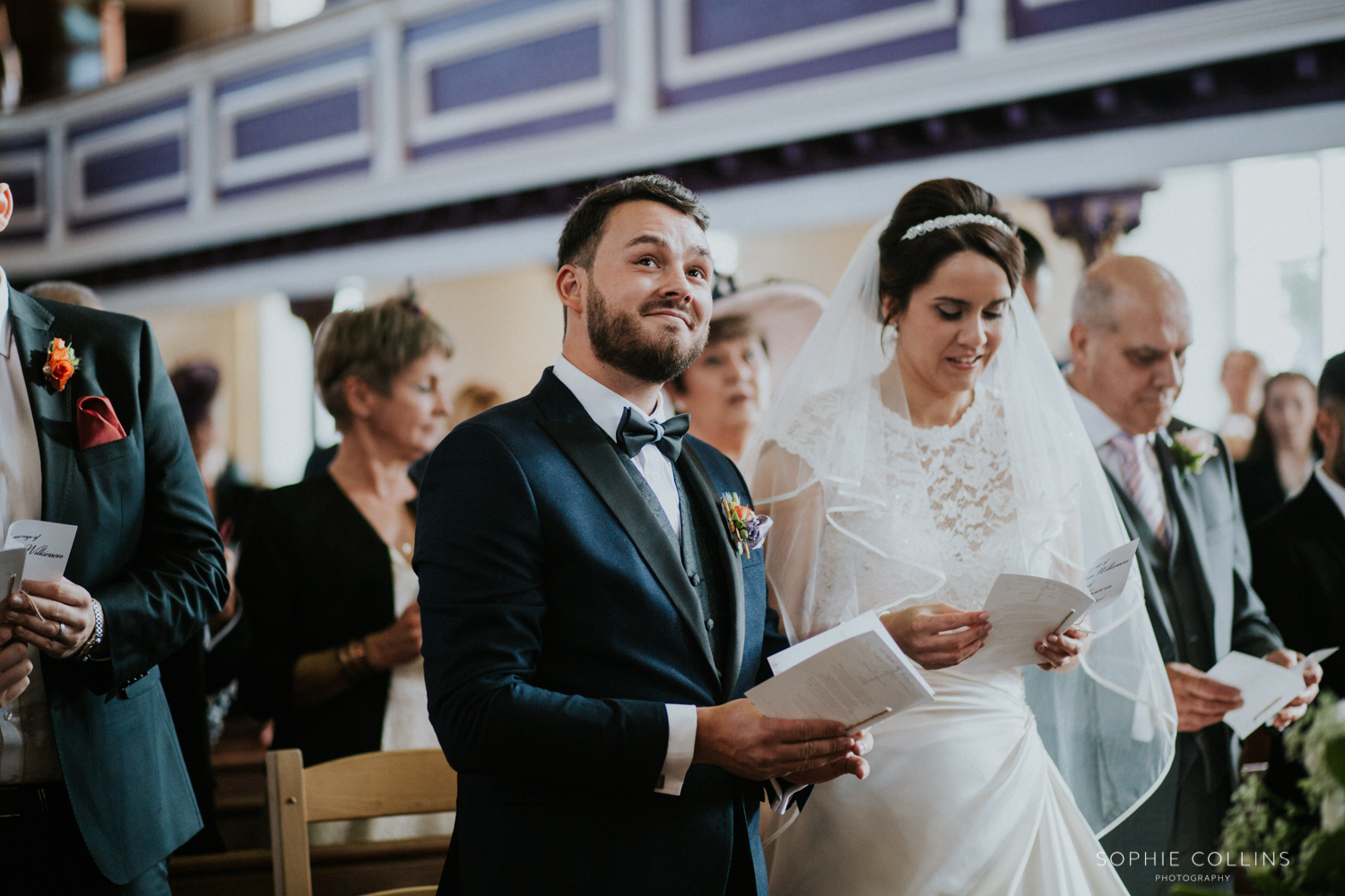 happy groom in ceremony 