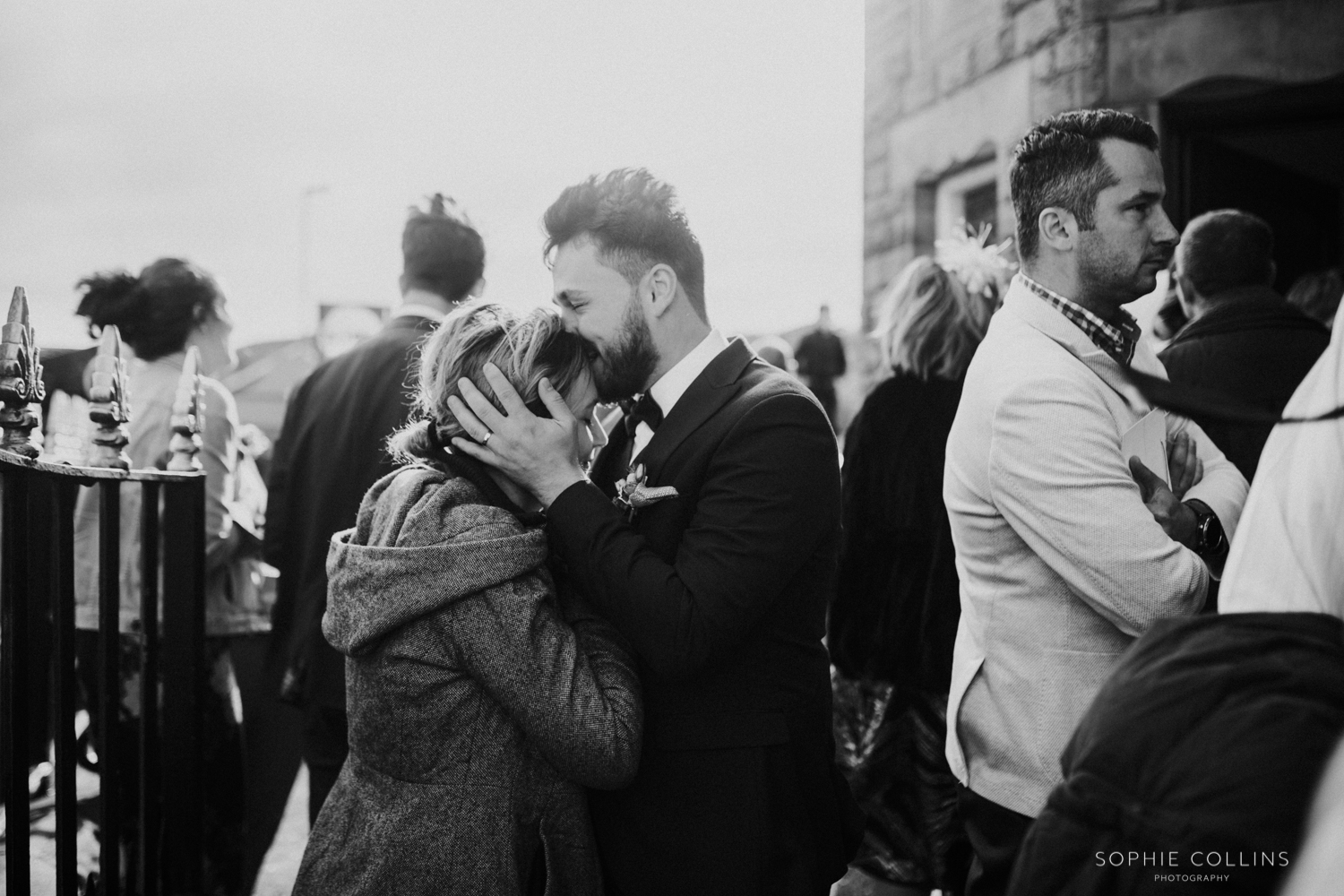 groom kissing someones head