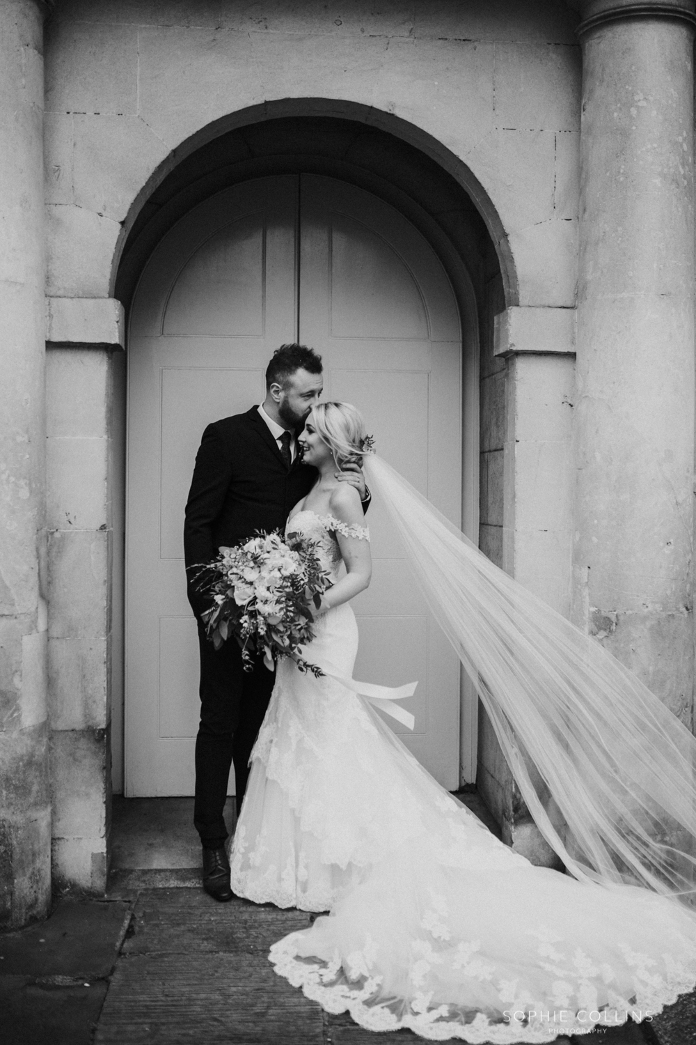 groom kissing the bride