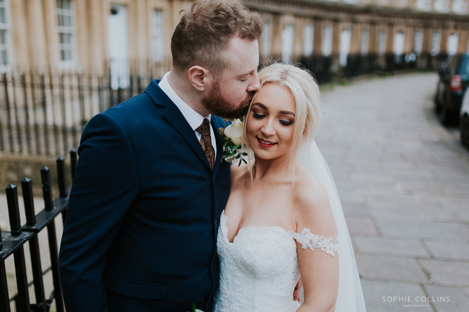 groom kissing the bride