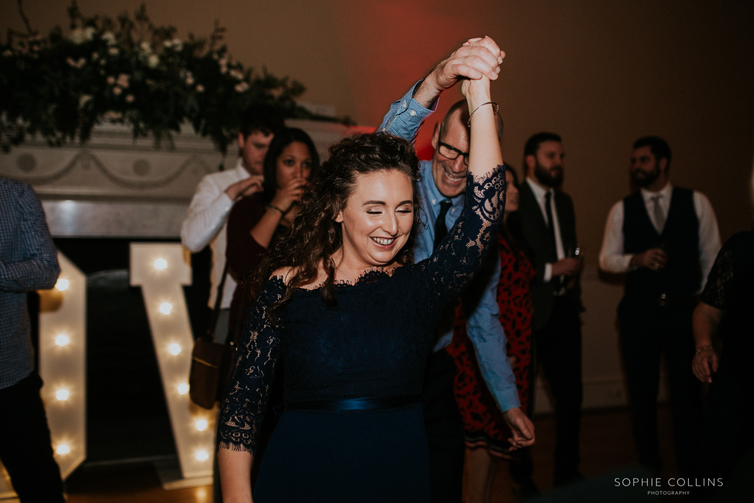 sister of the bride dancing 