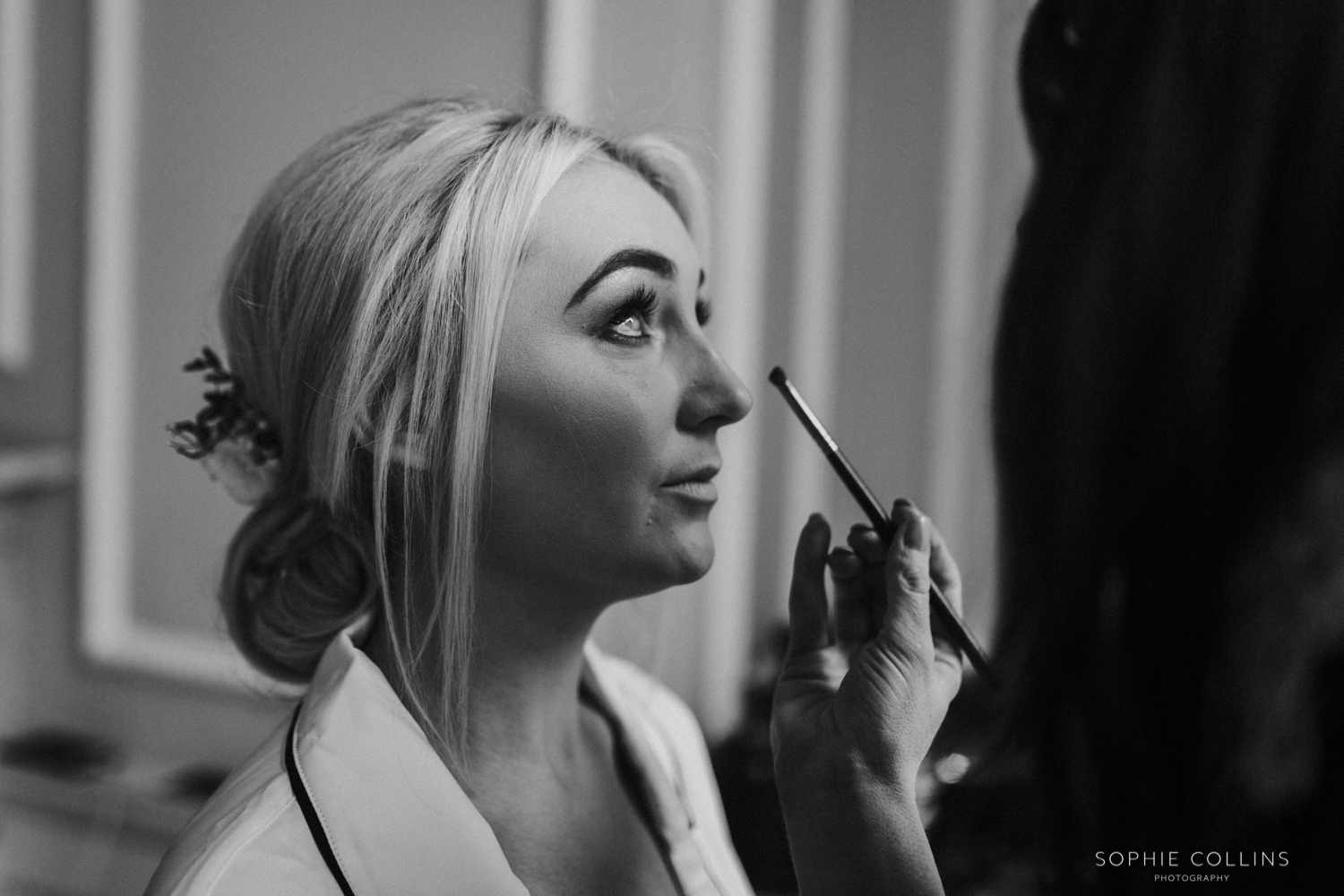 bride having her make-up done