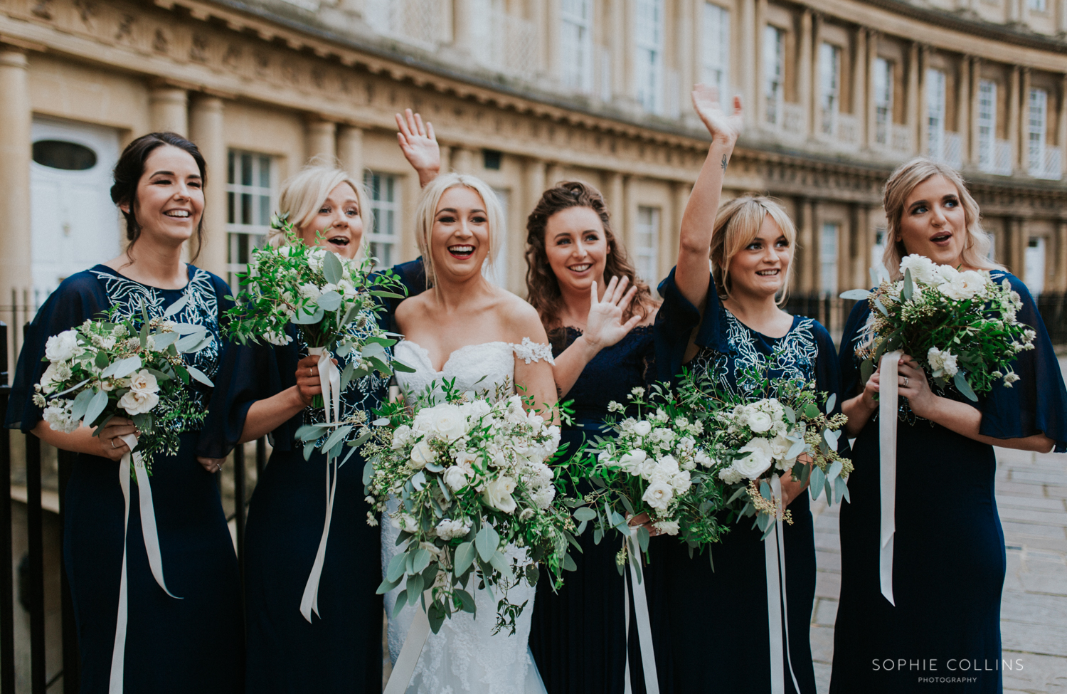 bridesmaids waving 