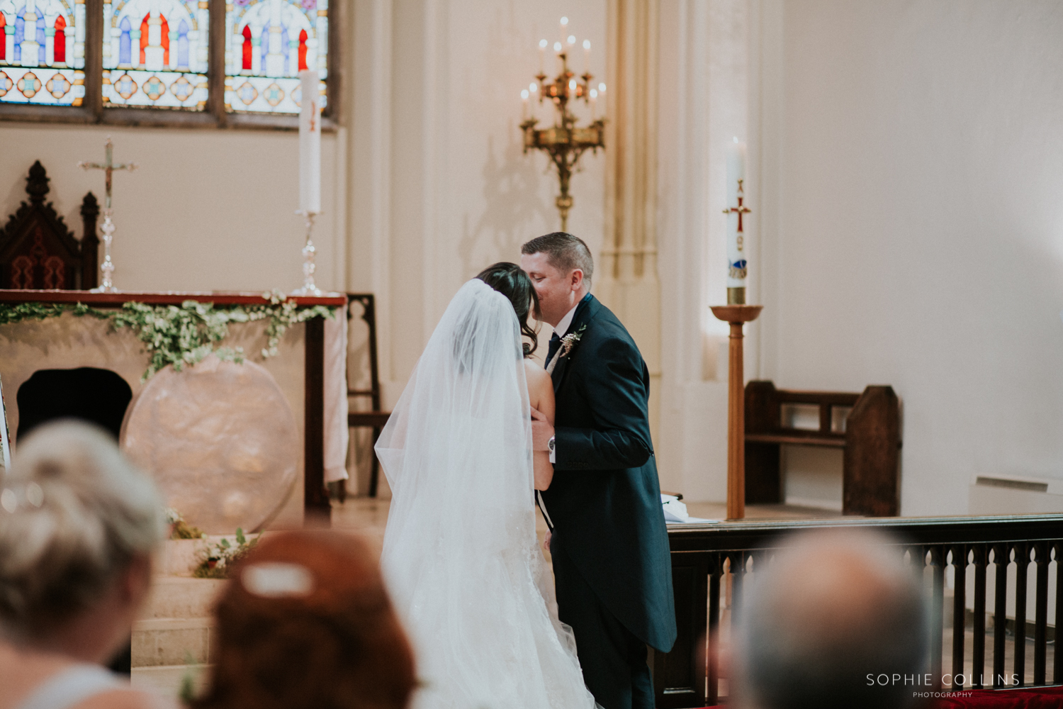 bride and groom first kiss 